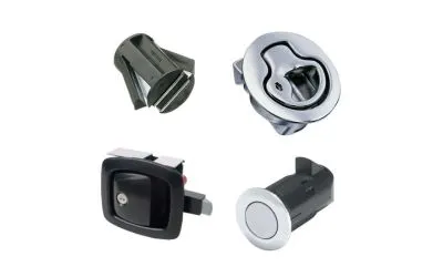 四种不同类型的金属和塑料Southco按压关闭闩锁在白色背景上。