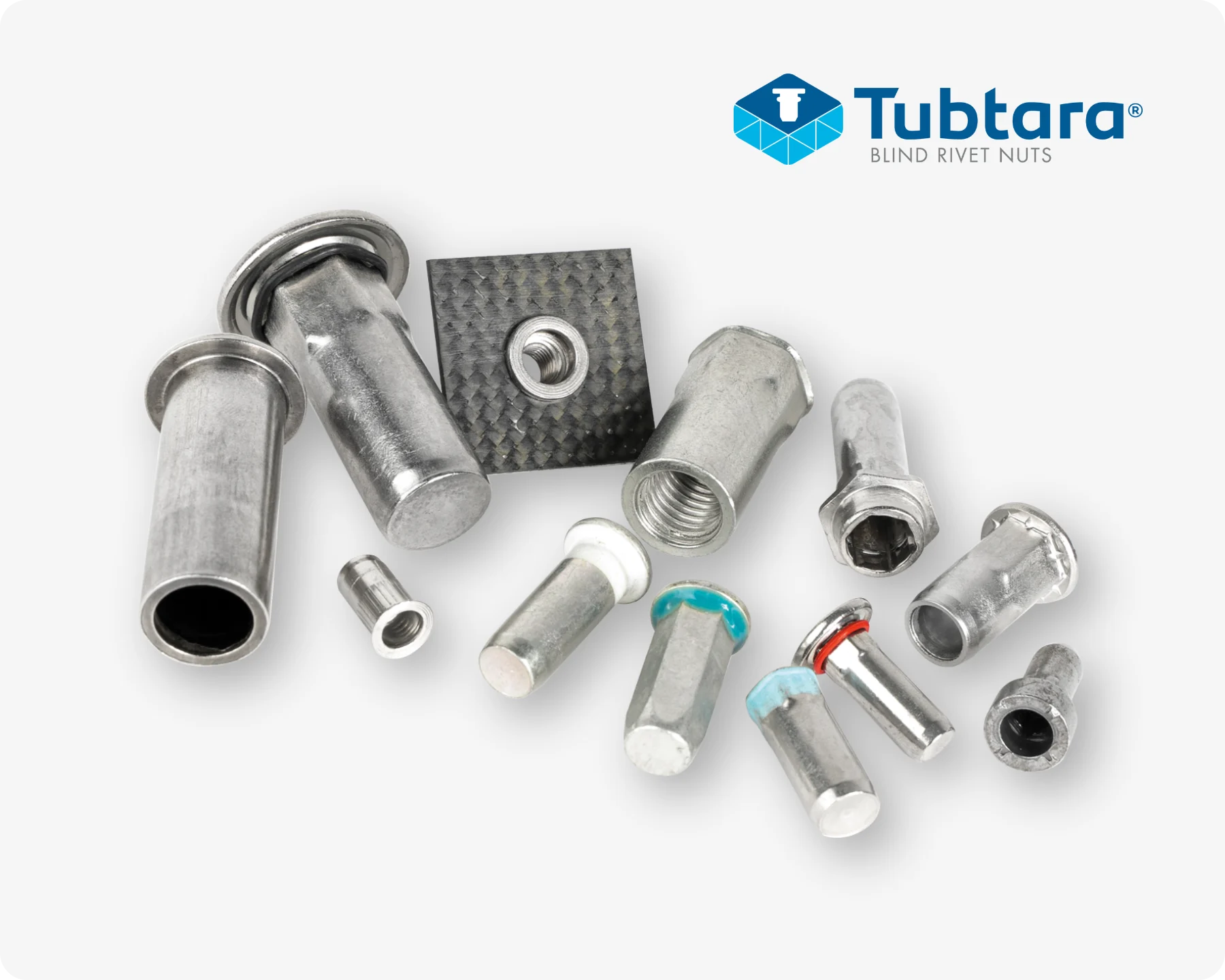 一组不同的Tubtara铆螺母,包括开口和闭口铆螺母,以及带有头下密封的铆螺母。